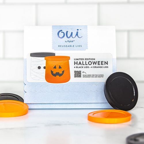 Packaging for orange and black Oui by Yoplait Halloween Seasonal lids.